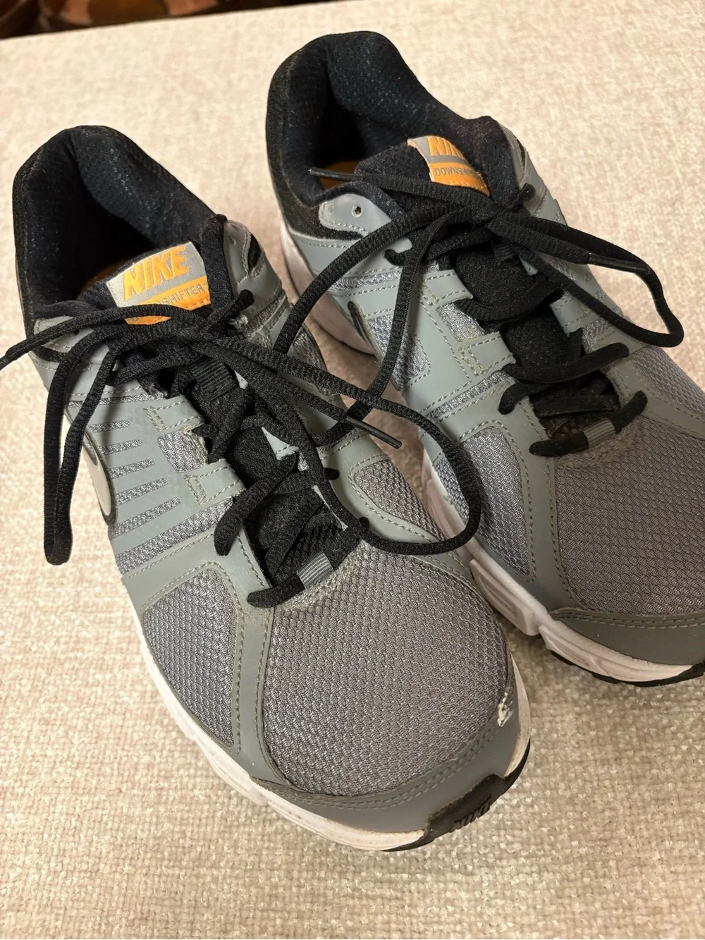 Nike Men’s Gray and Black DownShifter 5 Running Shoes with Orange Logo Size 9.5